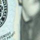 Twenty dollars bills - close up and reflection of US paper money